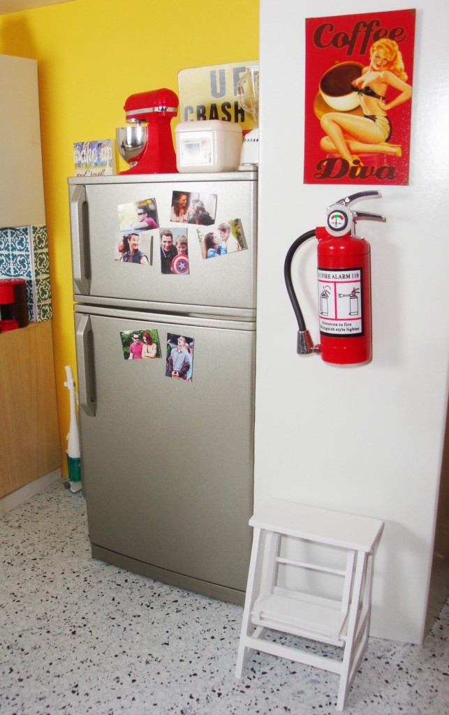 Candid photos of the Avengers, and tin signs (aka magnets) add a touch of Darcy Lewis' personality to her kitchen, and tells you about the important people in her life.